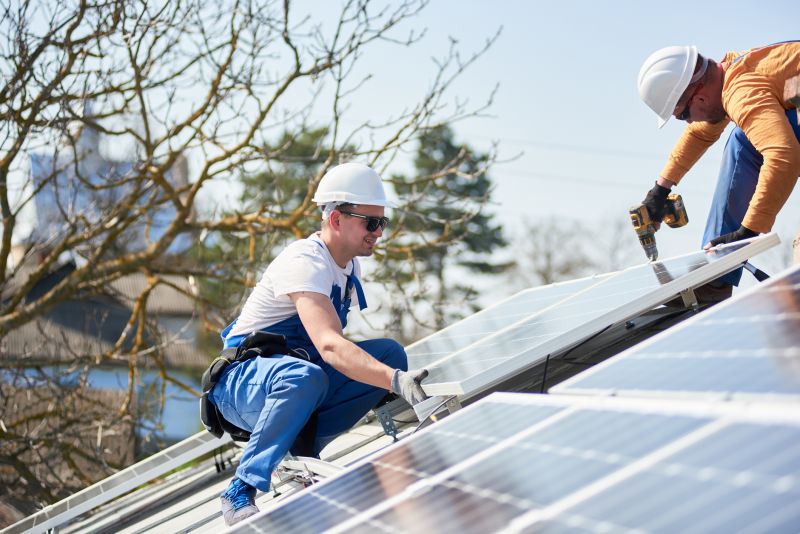 Technician Working on Roof